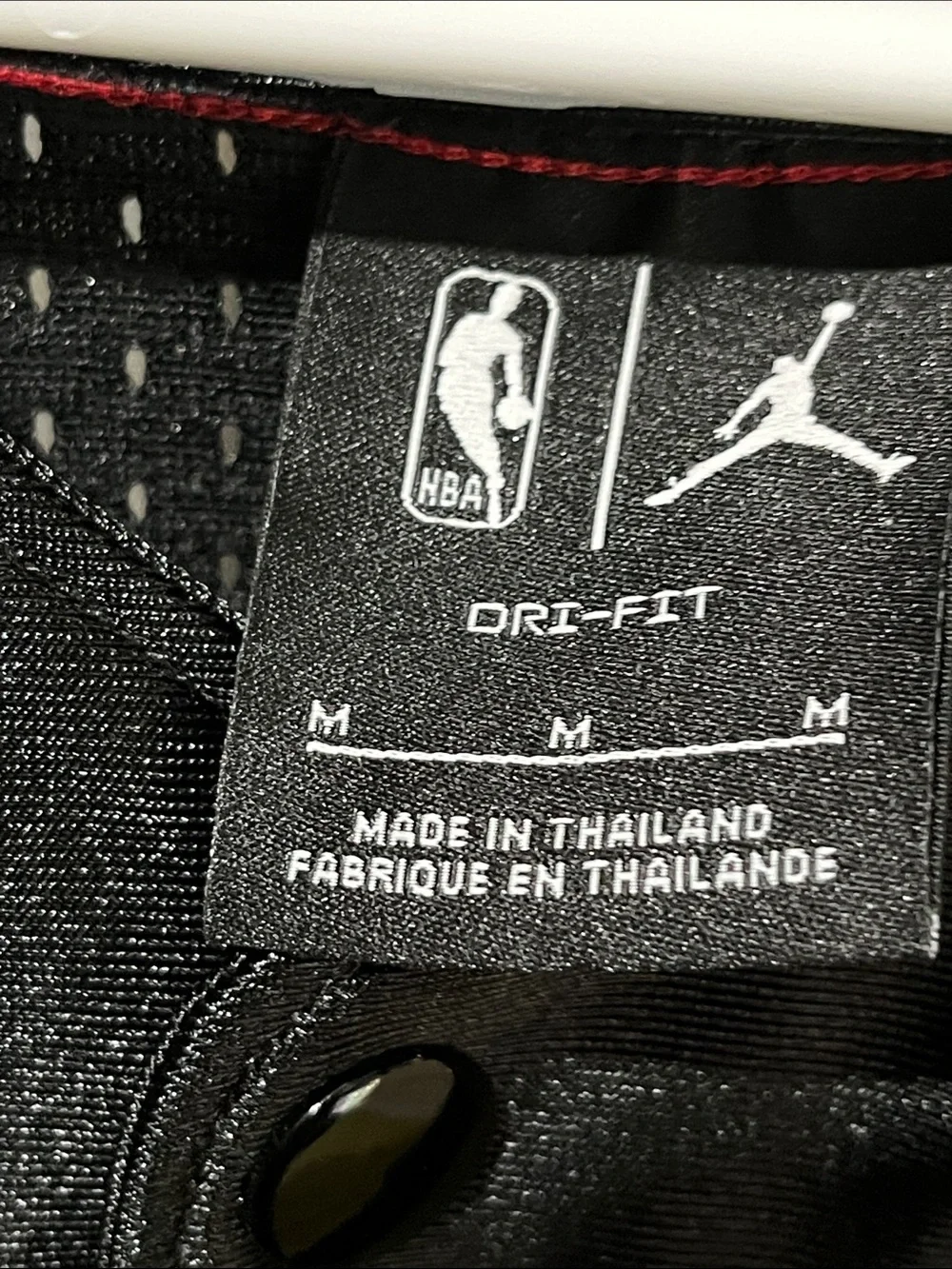 Nike official button